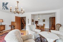 Wohnzimmer III Monheim-Baumberg: gro�er Garten mit solidem Backstein-Reihenhaus sowie Erweiterungs-Potential