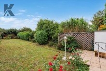 Garten I Monheim-Baumberg: gro�er Garten mit solidem Backstein-Reihenhaus sowie Erweiterungs-Potential