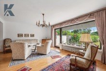 Wohnzimmer II Monheim-Baumberg: gro�er Garten mit solidem Backstein-Reihenhaus sowie Erweiterungs-Potential